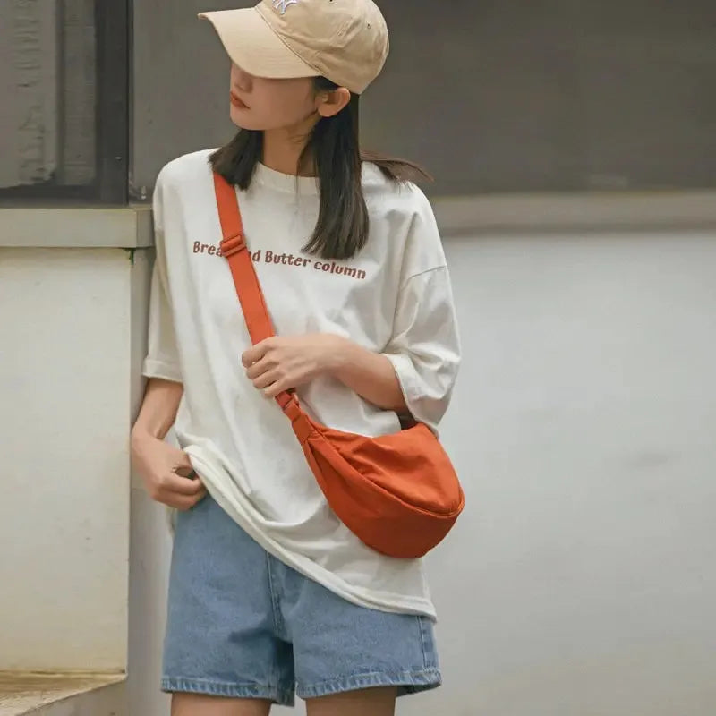 Bolso Brisa naranja llevado en cruzado